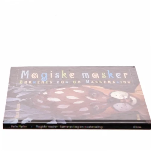 Magiske masker : børnenes bog om maskemaling af Helle Møller (f. 1964-10-24) (Bog)