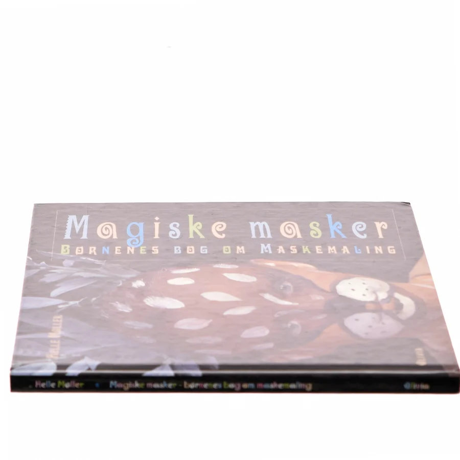 Magiske masker : børnenes bog om maskemaling af Helle Møller (f. 1964-10-24) (Bog)