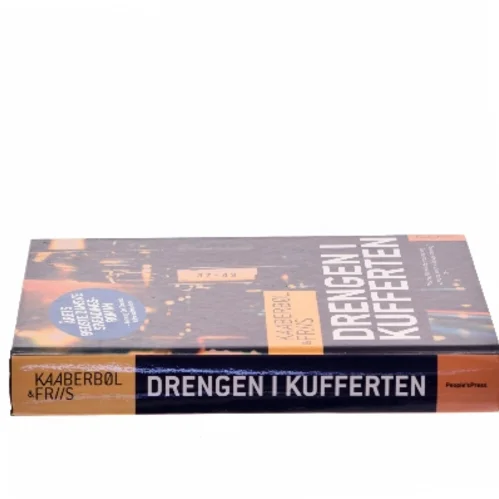 Drengen i kufferten : kriminalroman af Lene Kaaberbøl (Bog)