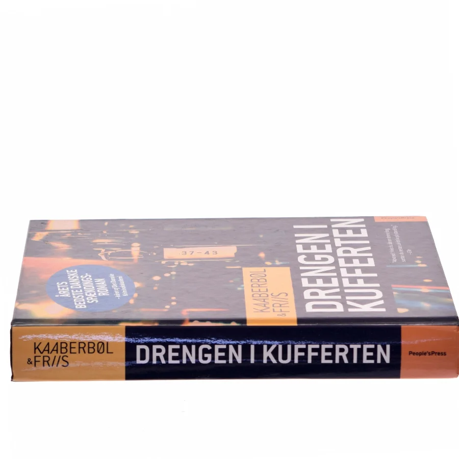 Drengen i kufferten : kriminalroman af Lene Kaaberbøl (Bog)