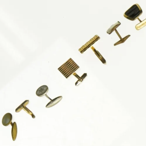 Manchetknapper i blandet design