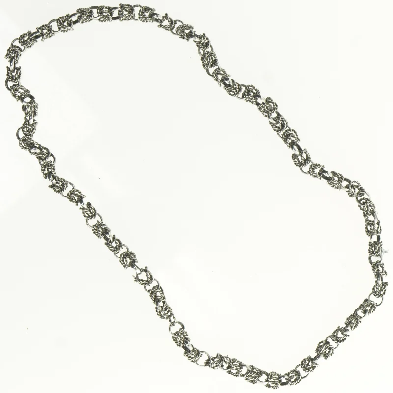 Sølvfarvet kædehalskæde (str. Ø 24 cm)