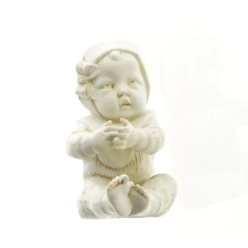 Porcelænsfigur af baby (str. 12 x 6 cm)