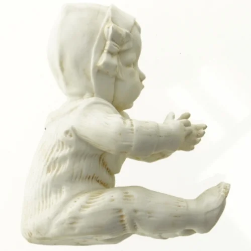 Porcelænsfigur af baby (str. 12 x 6 cm)