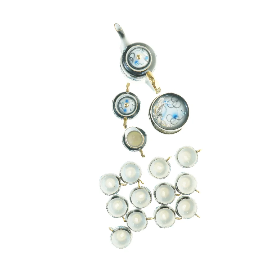 Tesæt med dragemønster fra Manna (str. 5 x, 6 cm til 18,5 x 9,5 cm)