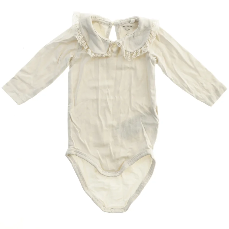 Langærmet bodystocking med krave fra Name It (str. 62)