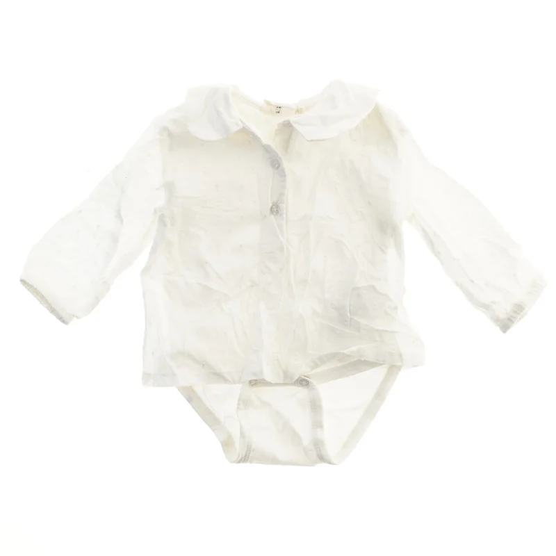 Hvid bodystocking med krave fra Minymo (str. 68)