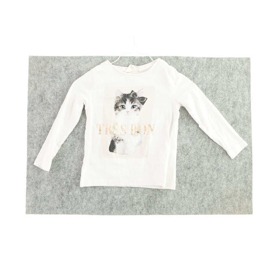 Bluse fra H&M (str. 92)