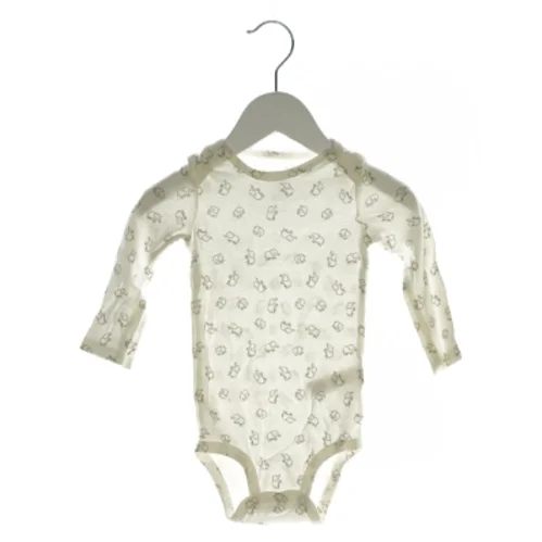Langærmet bodystocking fra Carter's (Str. 12 mdr)