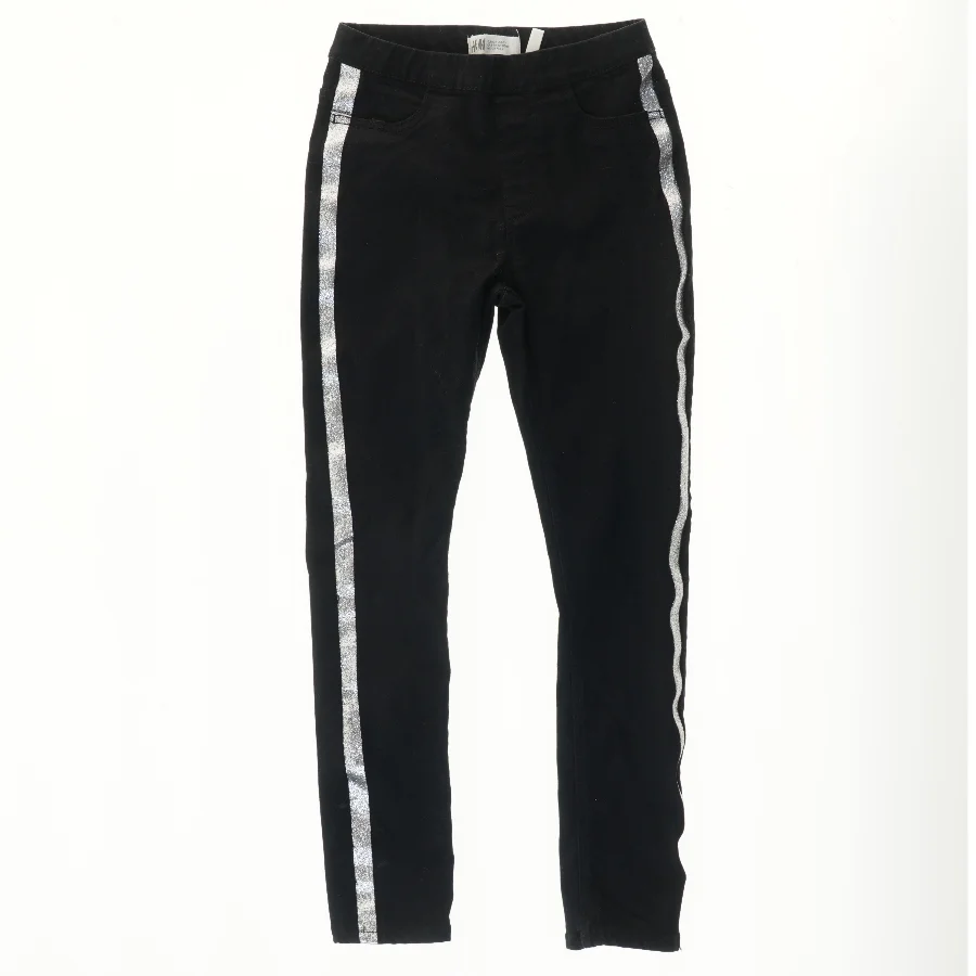 Lange sorte bukser med glitter striber fra H&M (str. 134)