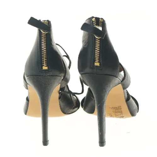 Sort stiletter med snørebånd fra H&M (str. 40 )