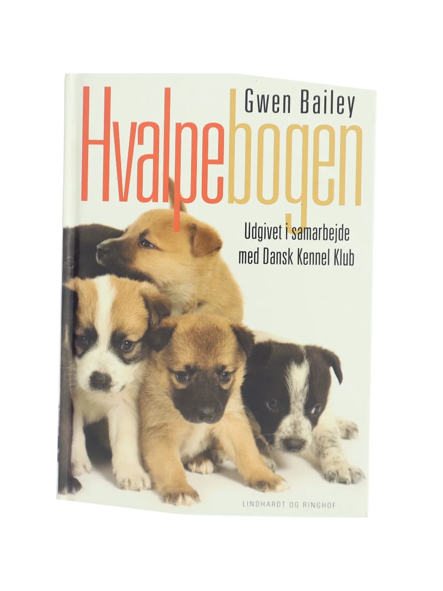 Forsiden af Hvalpebogen : sådan får du en glad og velopdragen hund af Gwen Bailey