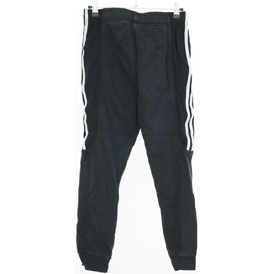 Sporty træningsbukser med striber fra Adidas (str. 140)