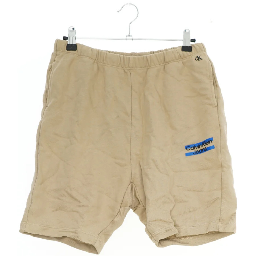 Beige shorts fra Calvin Klein (str. 164)