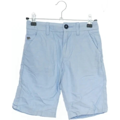 Lyseblå shorts fra Jasper J Conran (str. 134)