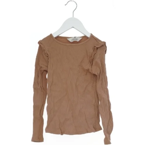 Langærmet ribbet bluse fra H&M (str. 128)