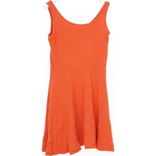 Orange kjole med stropper fra H&M (str. 140)