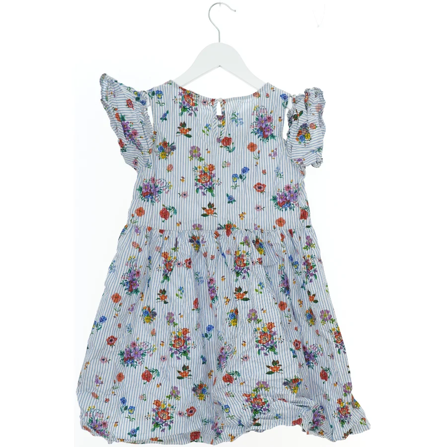 Blomstret kjole til børn fra H&M (str. 140)