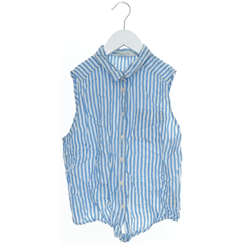 Ærmeløs skjorte med vertikale striber fra H&M (str. 170)