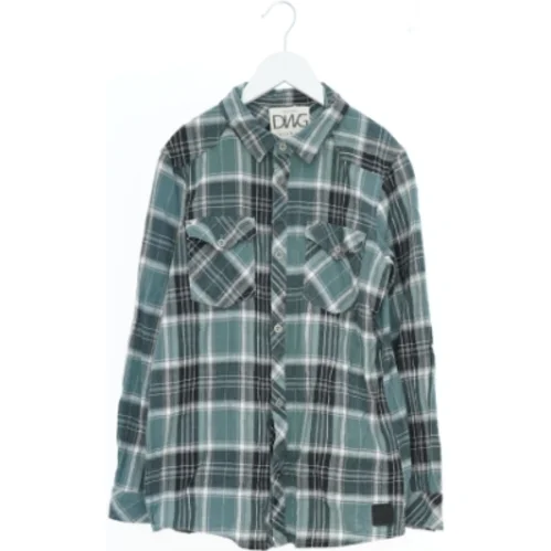 Skjorte med tern fra DNG (str. 164)