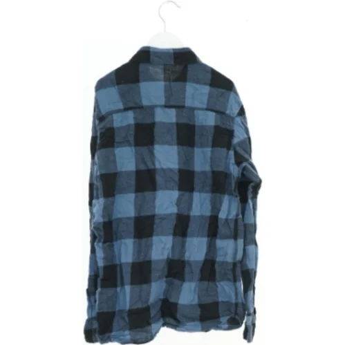 Skjorte med skotteprint fra H&M (str. 164)