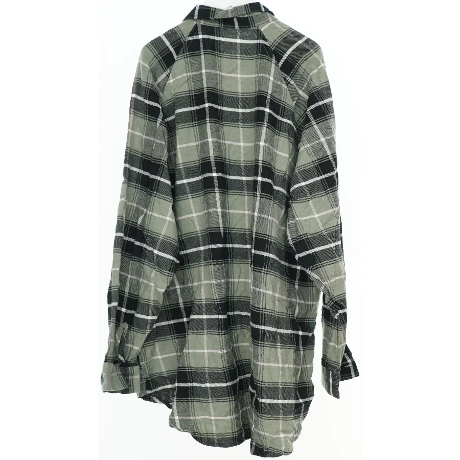 Langærmet ternet skjorte fra H&M (str. 164)