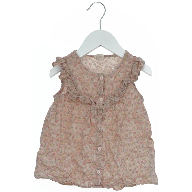 Børnebluse med blomstermønster fra H&M (str. 98)