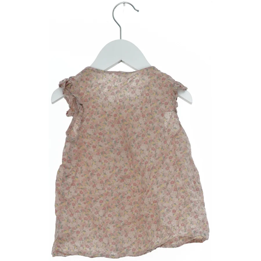 Børnebluse med blomstermønster fra H&M (str. 98)