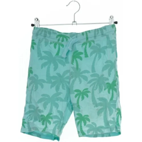 Badeshorts med palmeprint fra H&M (str. 134)