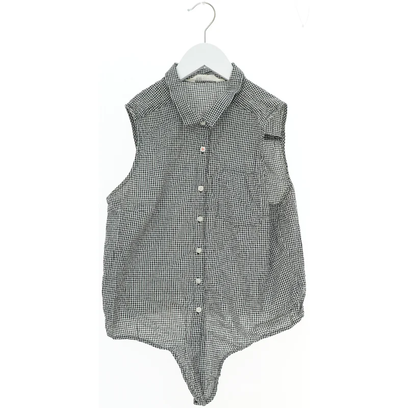 Kortærmet ternet skjortebluse fra H&M (str. 170)