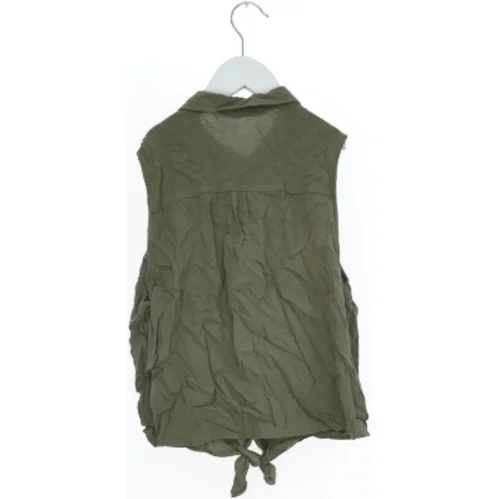 Ærmeløs skjorte med knude fra H&M (str. 170)