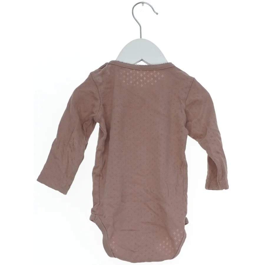 Langærmet bodystocking til baby fra Name It (str. 74)