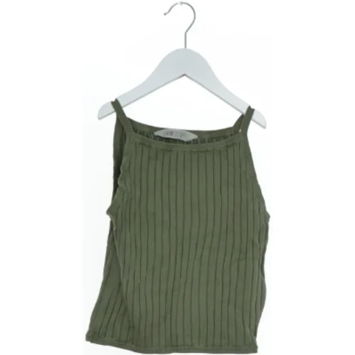 Grøn ribbet top fra H&M (str. 140)