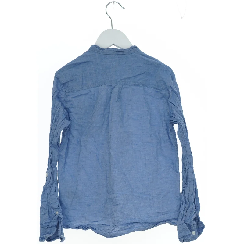 Langærmet blå skjorte fra H&M (str. 140)