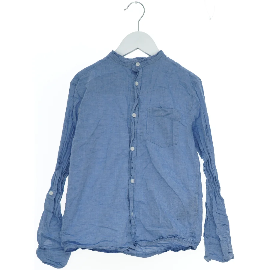 Langærmet blå skjorte fra H&M (str. 140)