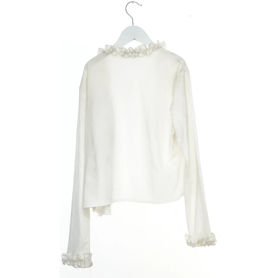 Hvid cardigan med flæser fra Morrison (str. 164)