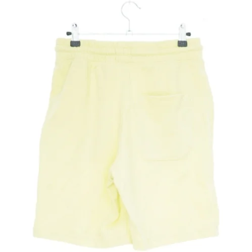 Gule shorts med grøn tekst fra H&M (str. S)