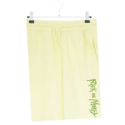 Gule shorts med grøn tekst fra H&M (str. S)