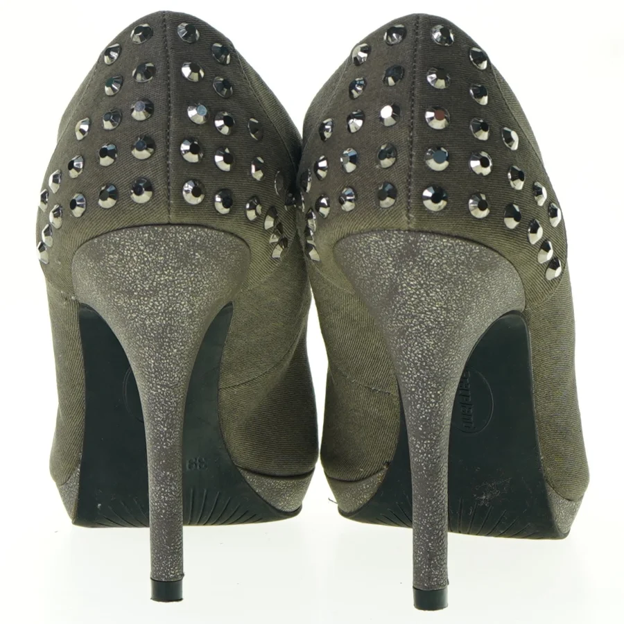 Stiletter fra Graceland (str. 39)