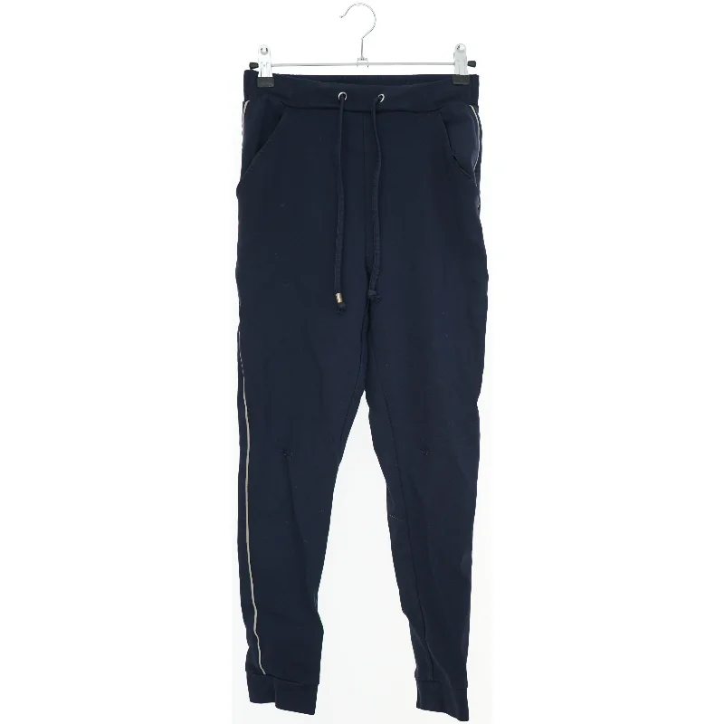 Blå sweatpants med snøre og lommer fra NIFTY (str. 152)