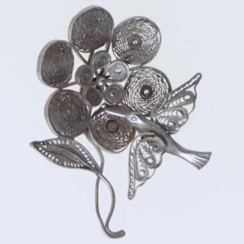 Dekorativ fuglebroche i sølv (str. 5 cm)