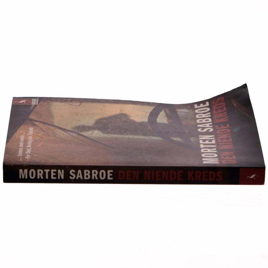 Den niende kreds : roman af Morten Sabroe (Bog)