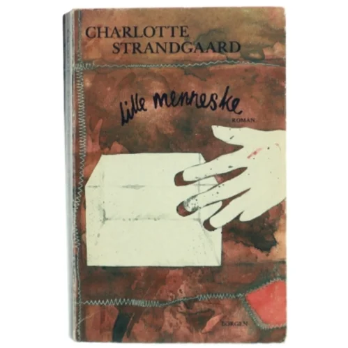 Paperback roman 'Lille menneske' af Charlotte Strandgaard
