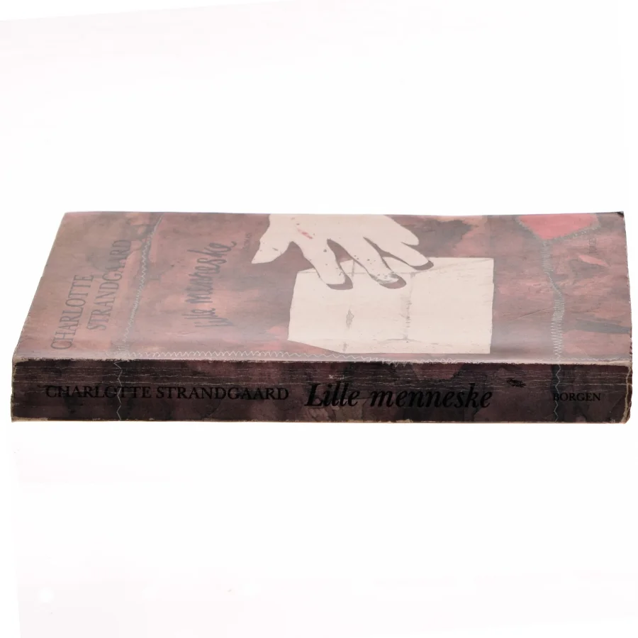 Paperback roman 'Lille menneske' af Charlotte Strandgaard