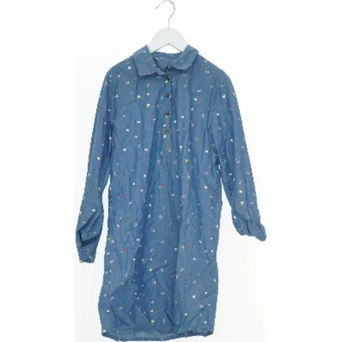 Blå kjole med mønster fra H&M (str. 140)