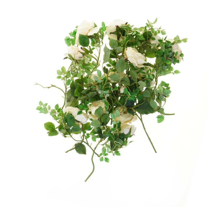 Dekorativ blomsterbukse med kunstige roser