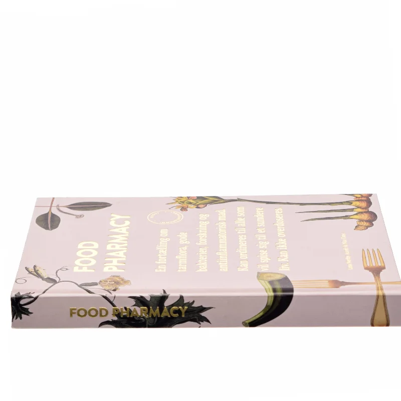 Food pharmacy : en fortælling om tarmflora, gode bakterier, forskning og antiinflammatorisk mad - kan ordineres til alle, som vil spise sig til et sundere liv - kan ikke overdoseres : boost immunforsvaret af Mia Clase (Bog)