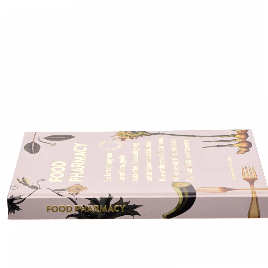 Food pharmacy : en fortælling om tarmflora, gode bakterier, forskning og antiinflammatorisk mad - kan ordineres til alle, som vil spise sig til et sundere liv - kan ikke overdoseres : boost immunforsvaret af Mia Clase (Bog)