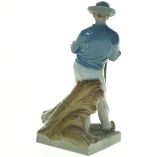 Porcelænsfigur Mand med le fra Royal Copenhagen (str. 25 x 13 cm)