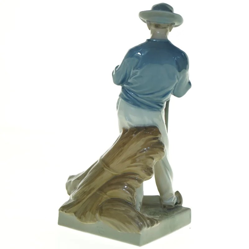 Porcelænsfigur Mand med le fra Royal Copenhagen (str. 25 x 13 cm)